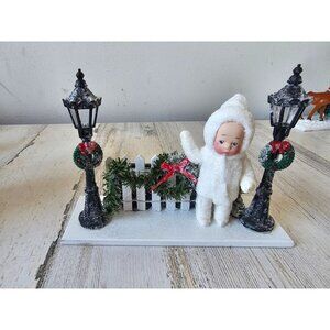 Vintage Elaine roesle holiday at home St Nicholas snow children statue figurine